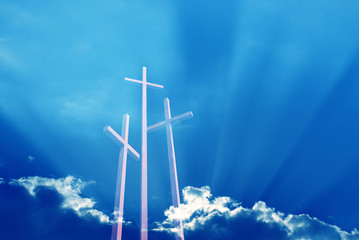 Wall Mural - Three crosses over bright dramatic sky