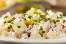 Traditional German Potato Salad With Cucumber, Onion And Mayonna