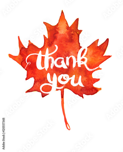 Big bright orange maple leaf with white hand written words “thank you