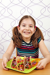 Wall Mural - happy little girl with tacos