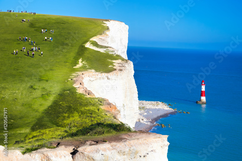 Fotografie, Obraz Beachy Head Lighthouse with chalk cliffs near the Eastbourne, East Sussex, Engla