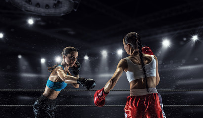 Wall Mural - Girls boxing in ring . Mixed media