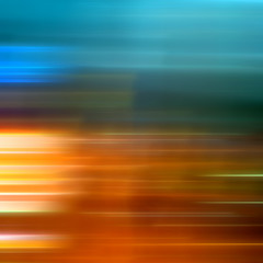 Background of glowing blurred horizontal lines of light. Yellow, orange.red, blue, blue.