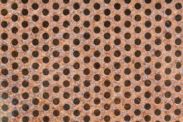 rusty perforated plate background