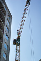 Construction crane against the sky