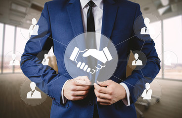 Wall Mural - businessman pushing button handshake icon web