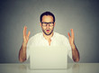 © pathdoc - Stressed man looking at his laptop computer