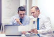 © Syda Productions - two businessmen having discussion in office