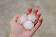 Hail ice in hand after a heavy storm