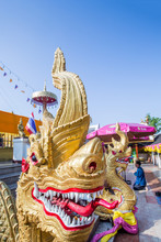Naga Head Staircase And Devotee At Doi Kham (Wat Phra That Doi Kham) (Temple Of The Golden Mountain), Chiang Mai