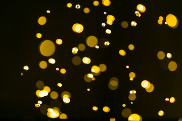 Wall Mural - glitter vintage lights background. dark gold and black. defocuse