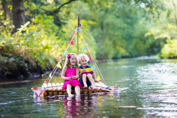 Canvas Print - Kids on wooden raft