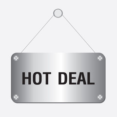 silver metallic hot deal sign hanging on the wall 