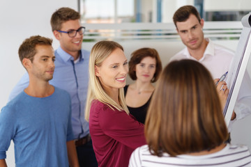 Canvas Print - junge geschäftsleute in einer fortbildung