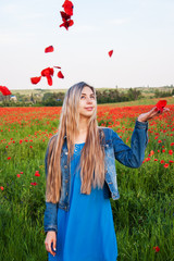 Poster - young girl in the poppy field