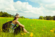 © kieferpix - Girl relaxing in a field enjoying nature.