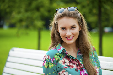 Closeup portrait of a happy young woman smiling