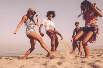 Wall Mural - Active game on the beach.