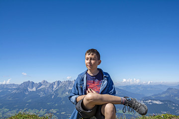 Wall Mural - Young hiker on the Kitzbuhel mountains, Tirol, Austria