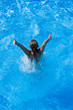 © Netfalls - woman with swimsuit swimming on a blue water pool