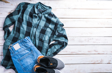 cool fashion casual men outfit on wooden table