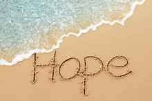 Hope Message On The Beach Sand.