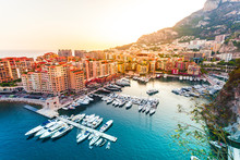 Panoramic View Of Port De Fontvieille In Monaco. Azur Coast. Colorful Bay With A Lot Of Luxury Yachts In Sunset.