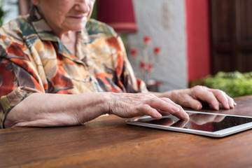 Senior woman using tablet