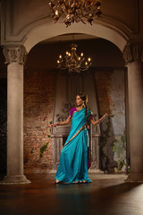 Beautiful young woman in traditional indian clothing