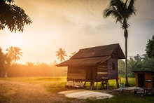 Thai Cottage With Sunrise Morning And Fog Or The Original Inhabitants Life Of People In Thailand