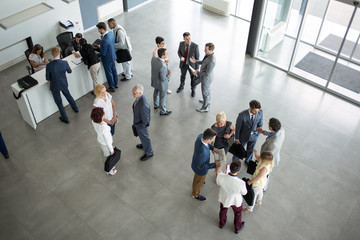 successful group of people in suit talking.