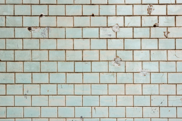 Colorful old tile wall background.