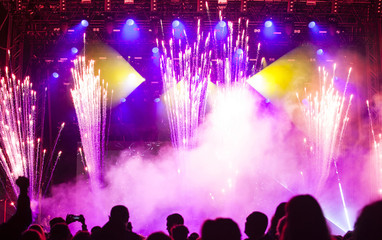 Wall Mural - Cheering crowd in front of stage lights - retro photo