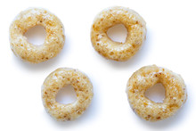 Collection Of Four Honey Cheerios Isolated On White From Above.