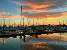 Colorful Sunset Over Boat Marina, Dramatic Clouds With Copy Space