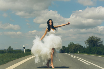 Wall Mural - wedding happy woman on road