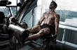 © Restyler - Strong bodybuilder training quads