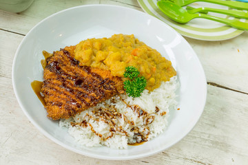 Fried chicken, fried fish and rice.