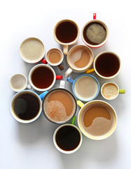 Canvas Print - Cups of coffee on white background, top view