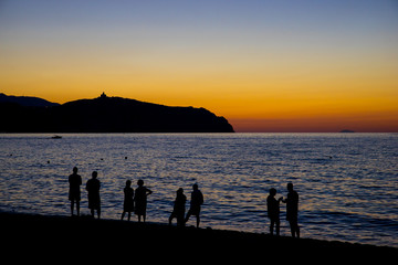 Wall Mural - People is watching amazing sunset