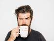 © Volodymyr - bearded serious man with cup of coffee or tea