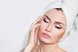 © Sabina_Nasom - Beautiful natural girl woman after cosmetic procedures , facelift , facial massage , visit a beautician , massage lines. Beautiful woman with a towel on his head. Beautiful female.