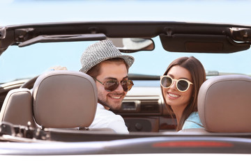 Poster - Couple in car on river shore