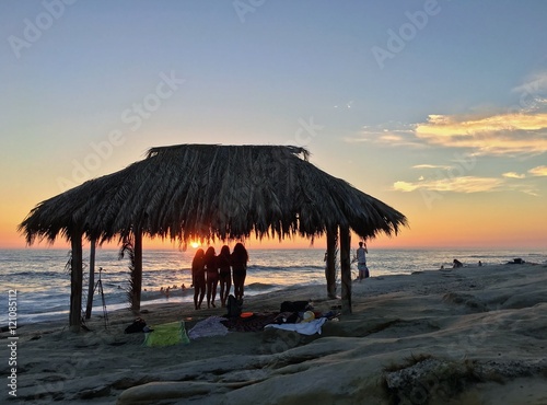 Silhouette Of Women Under A Beach Shack In La Jolla California Buy 