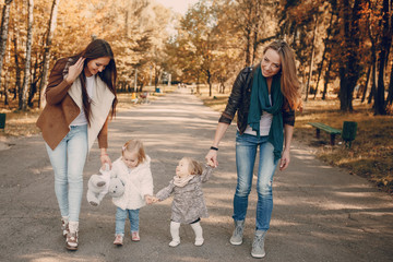 young family walking in the park