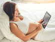 © georgerudy - Beautiful pregnant woman with gadget