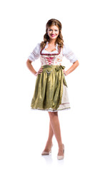 Wall Mural - Beautiful woman in traditional bavarian dress, studio shot