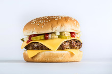 Hamburger Close Up On The Bright Background