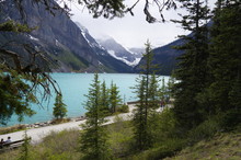 LAKE LOUISE, CANADA - MAY 28, 2016: View Of The Famous Lake Louise. Lake Louise Is The Second Most-visited Destination In The Banff National Park.