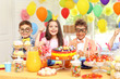 © Africa Studio - Children's funny birthday party in decorated room